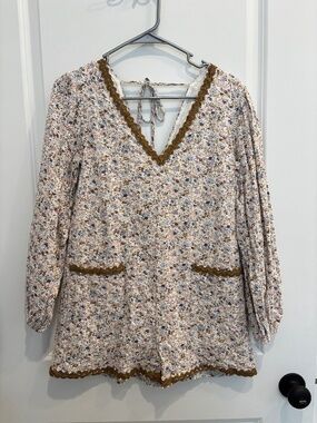 These Three Boutique Long Sleeved Eyelet Romper